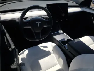 2024 Tesla Model Y z VIN 7SAYGDED7RF056570, wystawiony jako Copart lot #55097125 z przebiegiem 17 019 mil mil oraz Szkoda całkowita • Salvage title. Historia ofert i sprzedaży dostępna na DreamBid. Obrazek 8.