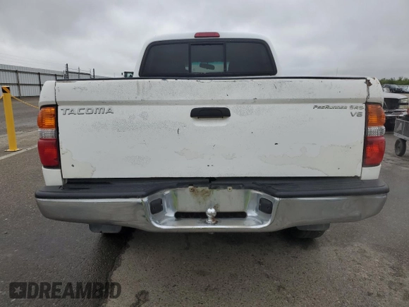 2002 Toyota Tacoma PreRunner with VIN 5TEGN92N82Z027415, listed as a Copart auction lot 49446035 with 349,964 mi miles and Salvage Title. Bid and sale history available at DreamBid. Image 6.