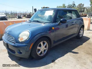 2010 MINI Cooper Hardtop with VIN WMWMF3C56ATZ24156, listed as a IAAI auction lot 41997887 with 149,308 mi miles. Bid and sale history available at carsss.com. Image 2.