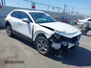 2021 Mazda CX-30 Premium with VIN 3MVDMBDL4MM319747, listed as a IAAI auction lot 42216293 with 53,500 mi miles and . Bid and sale history available at DreamBid. Image 1.