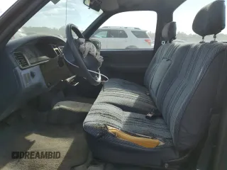 1994 Toyota T100 DX z VIN JT4VD10A3R0022337, wystawiony jako Copart lot #72793774 z przebiegiem 147 891 mil mil oraz Tytuł czysty. Historia ofert i sprzedaży dostępna na DreamBid. Obrazek 7.