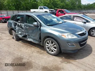 2012 Mazda CX-9 Grand Touring z VIN JM3TB2DA3C0355617, wystawiony jako IAAI lot #42198050 z przebiegiem 185 852 mil mil oraz . Historia ofert i sprzedaży dostępna na DreamBid. Obrazek 1.