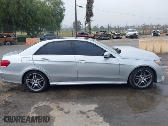 2014 Mercedes-Benz E E 350 Sport with VIN WDDHF5KB8EB009303, listed as a IAAI auction lot 42014846 with 97,214 mi miles. Bid and sale history available at carsss.com. Image 13.
