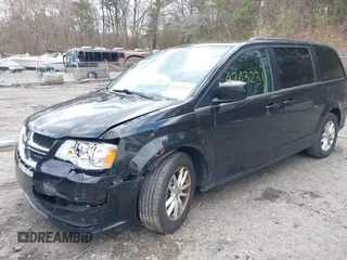 2019 Dodge Grand Caravan SXT with VIN 2C4RDGCG9KR804867, listed as a IAAI auction lot 42032311 with 157,351 mi miles and . Bid and sale history available at DreamBid. Image 17.