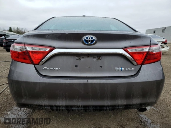 2015 Toyota Camry LE z VIN 4T1BD1FKXFU152666, wystawiony jako Copart lot #54879515 z przebiegiem 315 836 mil mil oraz Czysty tytuł • Clean title. Historia ofert i sprzedaży dostępna na DreamBid. Obrazek 6.