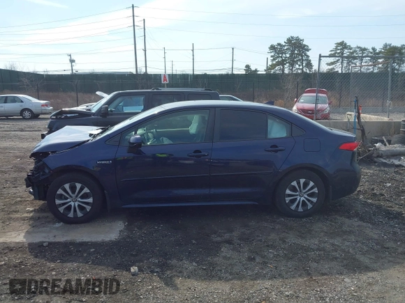 2021 Toyota Corolla Hybrid LE with VIN JTDEAMDE8MJ017192, listed as a IAAI auction lot 41669538 with 45,746 mi miles. Bid and sale history available at carsss.com. Image 14.