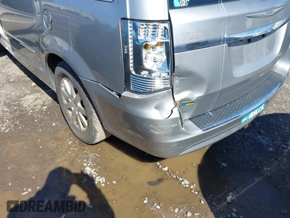 2016 Chrysler Town & Country Touring with VIN 2C4RC1BGXGR185642, listed as a IAAI auction lot 42092927 with 124,085 mi miles and . Bid and sale history available at DreamBid. Image 6.