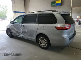 2015 Toyota Sienna XLE with VIN 5TDYK3DC9FS589378, listed as a Copart auction lot 54219075 with 117,766 mi miles and Salvage Title. Bid and sale history available at DreamBid. Image 2.