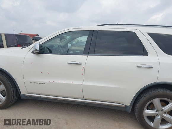 2011 Dodge Durango Citadel z VIN 1D4SD5GTXBC663963, wystawiony jako IAAI lot #42163491 z przebiegiem 188 277 mil mil oraz . Historia ofert i sprzedaży dostępna na DreamBid. Obrazek 14.