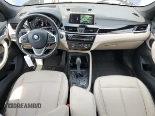 2019 BMW X1 sDrive28i z VIN WBXHU7C56K5N33695, wystawiony jako Copart lot #55492205 z przebiegiem 18 824 mil mil oraz Szkoda całkowita • Salvage title. Historia ofert i sprzedaży dostępna na DreamBid. Obrazek 8.