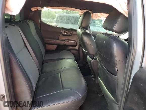 2020 Toyota Tacoma SR5 with VIN 3TMDZ5BN6LM097302, listed as a Copart auction lot 57503895 with 77,212 mi miles and Salvage title. Bid and sale history available at DreamBid. Image 10.