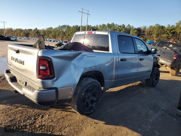 2025 Ram 1500 Big Horn with VIN 1C6RREFG2SN530885, listed as a Copart auction lot 87261914 with 3,814 mi miles and Salvage title. Bid and sale history available at DreamBid. Image 3.
