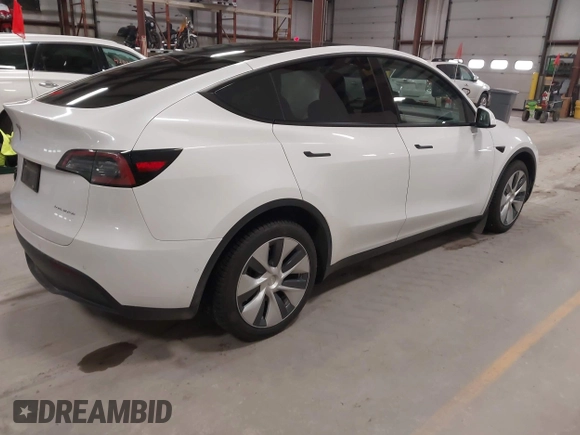 2022 Tesla Model Y Long Range z VIN 7SAYGDEE3NF358487, wystawiony jako IAAI lot #42036969 z przebiegiem 52 723 mil mil oraz . Historia ofert i sprzedaży dostępna na DreamBid. Obrazek 4.