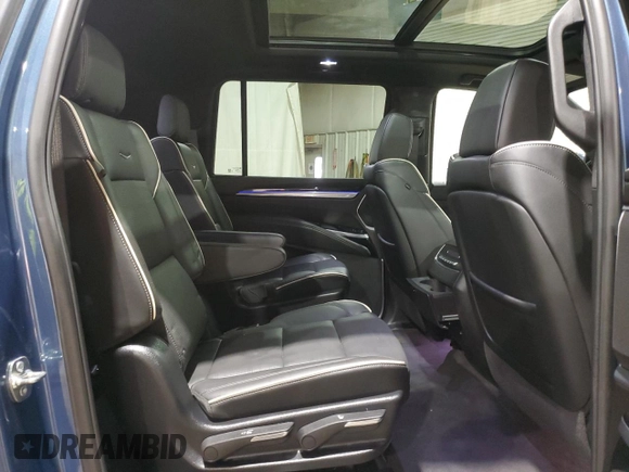 2025 Cadillac Escalade z VIN 1GYS9PRLXSR129201, wystawiony jako Copart lot #59422345 z przebiegiem 775 mil mil oraz Szkoda całkowita • Salvage title. Historia ofert i sprzedaży dostępna na DreamBid. Obrazek 11.