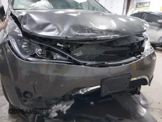 2017 Chrysler Pacifica Touring L z VIN 2C4RC1BGXHR753504, wystawiony jako IAAI lot #41330337 z przebiegiem 103 403 mil mil oraz . Historia ofert i sprzedaży dostępna na DreamBid. Obrazek 6.