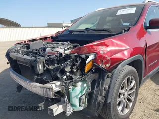 2019 Jeep Cherokee Altitude with VIN 1C4PJLLXXKD120325, listed as a IAAI auction lot 41838643 with 124,315 mi miles and . Bid and sale history available at DreamBid. Image 6.