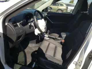 2015 Mazda CX-5 Touring with VIN JM3KE4CY6F0470164, listed as a Copart auction lot 48616815 with 0 mi miles and Salvage Title. Bid and sale history available at carsss.com. Image 7.