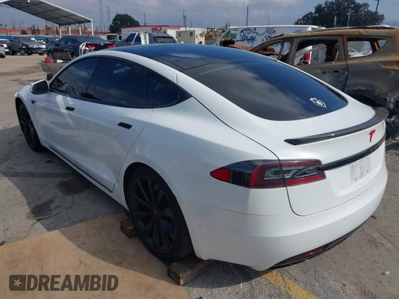2016 Tesla Model S 90D with VIN 5YJSA1E27GF153525, listed as a IAAI auction lot 41539221 with 145,771 mi miles and . Bid and sale history available at DreamBid. Image 3.