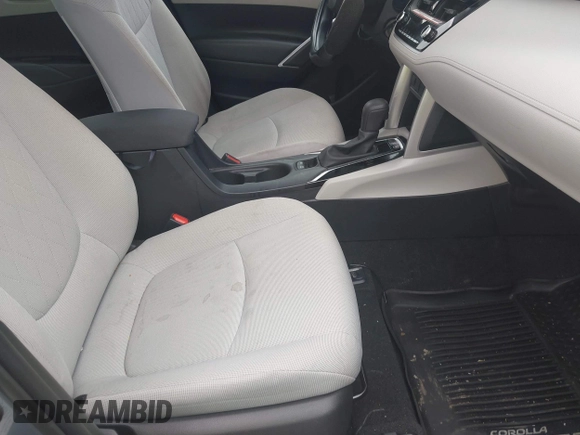 2022 Toyota Corolla Cross L with VIN 7MUAAABG0NV024424, listed as a IAAI auction lot 42261227 with 20,171 mi miles and . Bid and sale history available at DreamBid. Image 5.