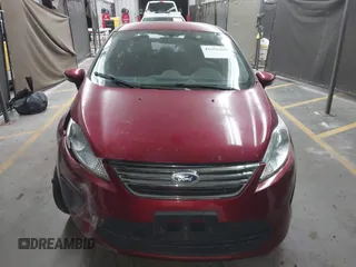 2013 Ford Fiesta SE z VIN 3FADP4BJ9DM167508, wystawiony jako IAAI lot #41696390 z przebiegiem Nie podano mil oraz . Historia ofert i sprzedaży dostępna na DreamBid. Obrazek 12.