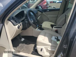 2013 Volkswagen Tiguan SE with VIN WVGBV7AX1DW009495, listed as a Copart auction lot 62289675 with Not provided miles and Salvage title. Bid and sale history available at DreamBid. Image 7.