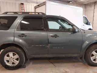 2012 Ford Escape XLT with VIN 1FMCU0D70CKC11664, listed as a IAAI auction lot 42280506 with 184,034 mi miles and . Bid and sale history available at DreamBid. Image 13.