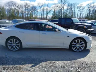 2016 Tesla Model S 90D with VIN 5YJSA1E2XGF171288, listed as a IAAI auction lot 41766075 with 112,927 mi miles. Bid and sale history available at carsss.com. Image 12.