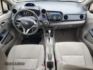 2010 Honda Insight LX with VIN JHMZE2H56AS022299, listed as a Copart auction lot 54872215 with 149,514 mi miles and Salvage title. Bid and sale history available at DreamBid. Image 8.