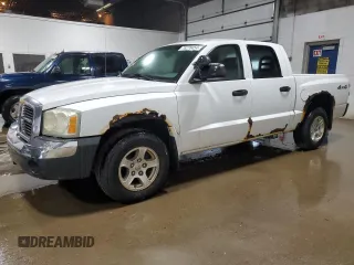 2005 Dodge Dakota SLT z VIN 1D7HW48K15S245809, wystawiony jako Copart lot #76278454 z przebiegiem 213 993 mil mil oraz Czysty tytuł • Clean title. Historia ofert i sprzedaży dostępna na DreamBid. Obrazek 1.
