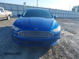 2018 Ford Fusion SE z VIN 3FA6P0H7XJR106776, wystawiony jako IAAI lot #42243361 z przebiegiem 174 000 mil mil oraz . Historia ofert i sprzedaży dostępna na DreamBid. Obrazek 12.