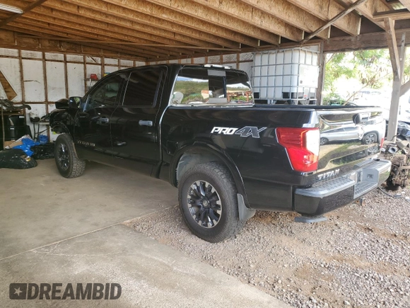 2018 Nissan Titan Pro-4X z VIN 1N6AA1E51JN531463, wystawiony jako Copart lot #52995885 z przebiegiem 62 873 mil mil oraz Szkoda całkowita • Salvage title. Historia ofert i sprzedaży dostępna na DreamBid. Obrazek 2.