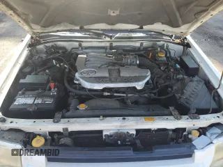 2003 Infiniti QX4 with VIN JNRDR09X33W250292, listed as a Copart auction lot 56020474 with 260,391 mi miles and Clean Title. Bid and sale history available at DreamBid. Image 11.
