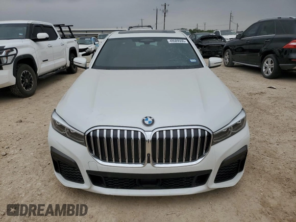 2021 BMW 7 Series 740i with VIN WBA7T2C06MCF88813, listed as a Copart auction lot 49589555 with 60,802 mi miles and Salvage title. Bid and sale history available at DreamBid. Image 5.