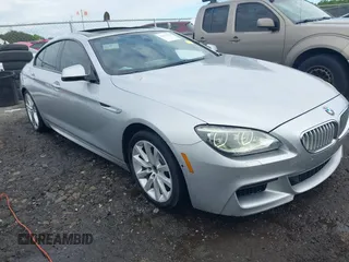 2014 BMW 6 Series 650i z VIN WBA6B2C58ED129639, wystawiony jako IAAI lot #42171786 z przebiegiem 108 677 mil mil oraz . Historia ofert i sprzedaży dostępna na DreamBid. Obrazek 1.