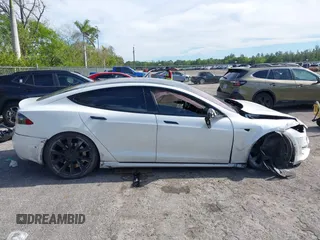 2020 Tesla Model S Long Range with VIN 5YJSA1E2XLF360260, listed as a IAAI auction lot 41241778 with 141,594 mi miles. Bid and sale history available at carsss.com. Image 13.