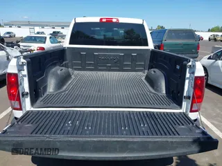 2024 Ram 1500 Classic SLT with VIN 1C6RR6GG4RS135980, listed as a IAAI auction lot 42086911 with 31,001 mi miles. Bid and sale history available at carsss.com. Image 19.