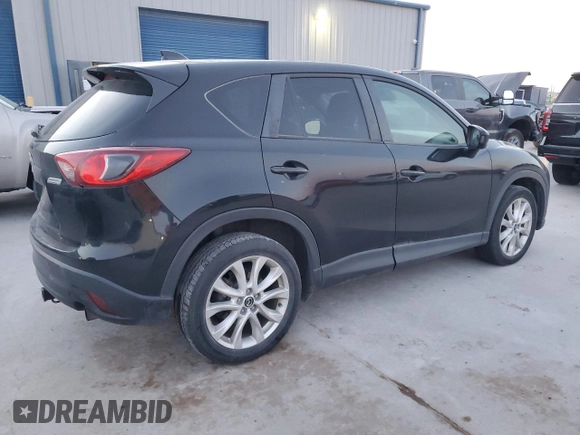2014 Mazda CX-5 Grand Touring with VIN JM3KE4DY5E0386043, listed as a Copart auction lot 48866995 with 183,626 mi miles and Salvage Title. Bid and sale history available at DreamBid. Image 3.