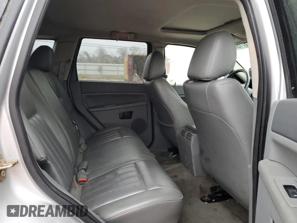 2006 Jeep Grand Cherokee Laredo with VIN 1J4HS48N26C215336, listed as a Copart auction lot 87671585 with 196,800 mi miles and Salvage Title. Bid and sale history available at carsss.com. Image 10.