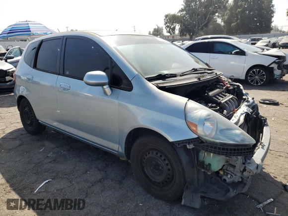2007 Honda Fit with VIN JHMGD37477S055538, listed as a Copart auction lot 73222124 with 125,205 mi miles and Salvage Title. Bid and sale history available at carsss.com. Image 4.
