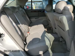 2003 Cadillac DeVille DTS z VIN 1G6KF57933U147843, wystawiony jako Copart lot #55875195 z przebiegiem 160 814 mil mil oraz Szkody całkowita. Historia ofert i sprzedaży dostępna na DreamBid. Obrazek 10.