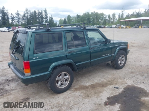 1999 Jeep Cherokee Sport with VIN 1J4FF68S5XL677243, listed as a IAAI auction lot 42221329 with 293,808 mi miles and . Bid and sale history available at DreamBid. Image 4.