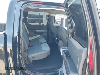 2023 Ford F-150 Lightning Pro with VIN 1FTVW1EV0PWG52297, listed as a IAAI auction lot 41730201 with 11,303 mi miles and . Bid and sale history available at DreamBid. Image 8.