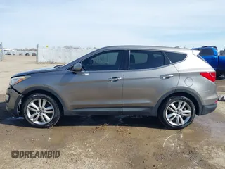 2013 Hyundai Santa Fe Sport z VIN 5XYZWDLA1DG003779, wystawiony jako IAAI lot #41761431 z przebiegiem 127 895 mil mil oraz . Historia ofert i sprzedaży dostępna na DreamBid. Obrazek 14.