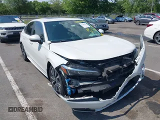 2022 Honda Civic EX with VIN JHMFE1F7XNX001918, listed as a IAAI auction lot 42400211 with 57,786 mi miles and . Bid and sale history available at DreamBid. Image 1.