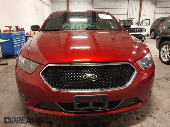 2014 Ford Taurus SHO with VIN 1FAHP2KT9EG130834, listed as a IAAI auction lot 41748199 with 98,857 mi miles and . Bid and sale history available at carsss.com. Image 13.
