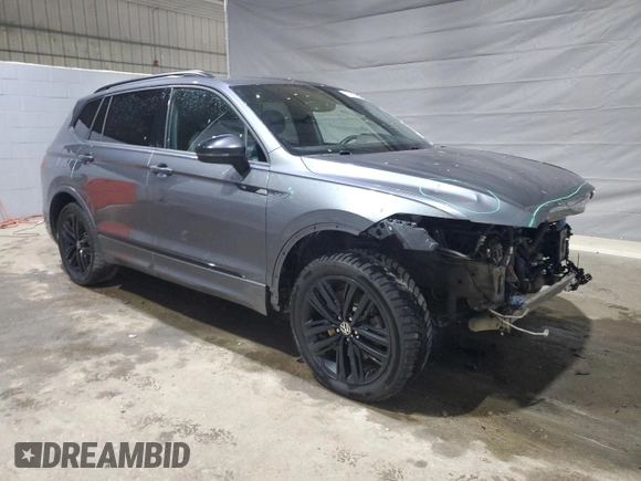 2022 Volkswagen Tiguan SE R-Line Black with VIN 3VV8B7AX6NM026562, listed as a Copart auction lot 57569015 with 115,478 mi miles and Salvage title. Bid and sale history available at DreamBid. Image 4.