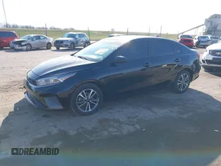2023 Kia Forte LXS with VIN 3KPF24AD1PE511666, listed as a IAAI auction lot 41832551 with 112,005 mi miles and . Bid and sale history available at DreamBid. Image 2.