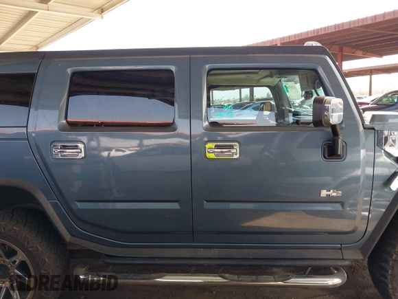 2005 Hummer H2 SUV with VIN 5GRGN23U25H107505, listed as a IAAI auction lot 41703768 with 213,723 mi miles. Bid and sale history available at carsss.com. Image 13.