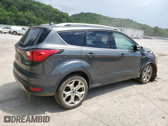 2019 Ford Escape Titanium с VIN 1FMCU9J9XKUA39544, выставлен на аукционе Copart как лот 62363005 с пробегом 80 831 миль миль и Списание • Salvage title. История ставок и продаж доступна на DreamBid. Изображение 3.