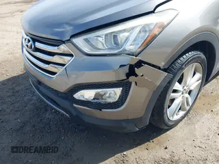 2013 Hyundai Santa Fe Sport z VIN 5XYZWDLA1DG003779, wystawiony jako IAAI lot #41761431 z przebiegiem 127 895 mil mil oraz . Historia ofert i sprzedaży dostępna na DreamBid. Obrazek 6.